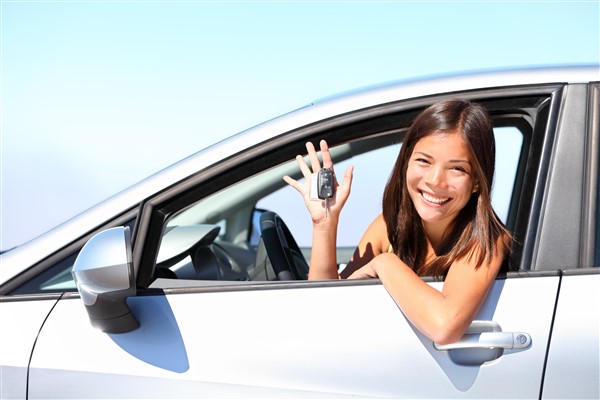 Image of a women waiving rental keys